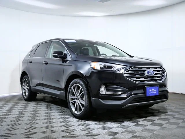 Certified Used 2024 Black Ford Titanium image 1
