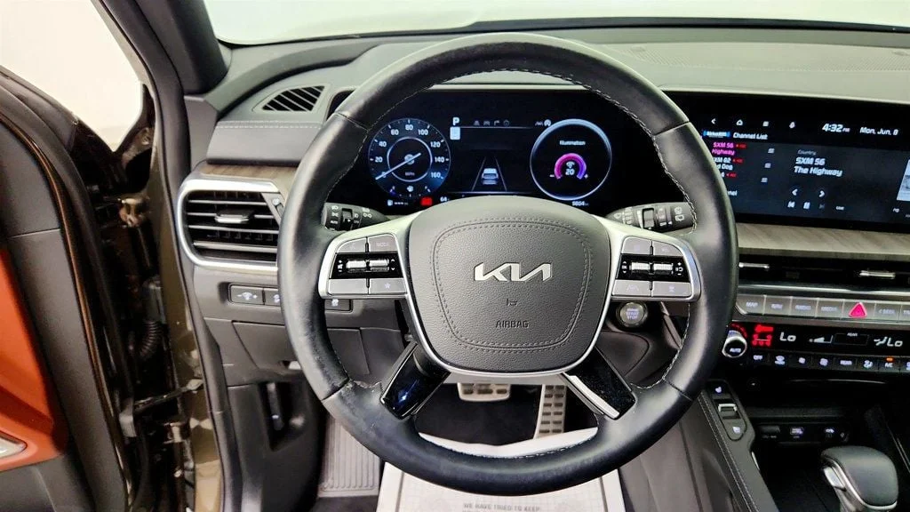 Used 2025 Dark Moss Kia SX AWD w/ Captain