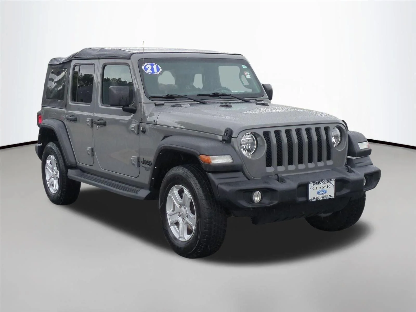 Used 2021 Granite Crystal Metallic Clearcoat Jeep Unlimited Sport S image 7