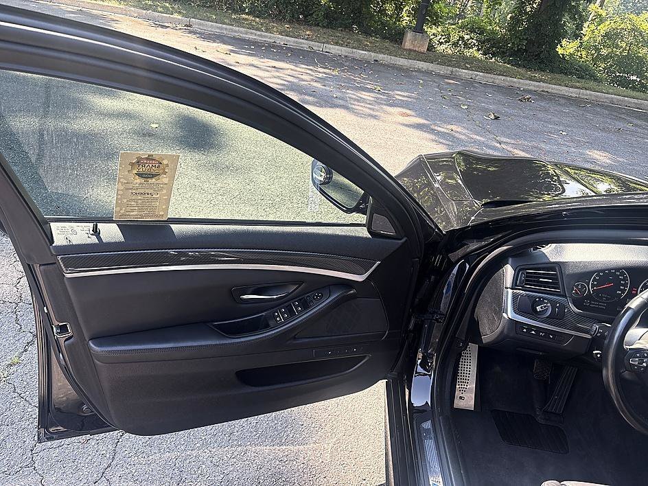 Used 2015 Black Sapphire Metallic BMW Base image 9