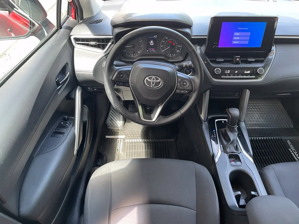 Used 2023 Barcelona Red Metallic Toyota LE image 12