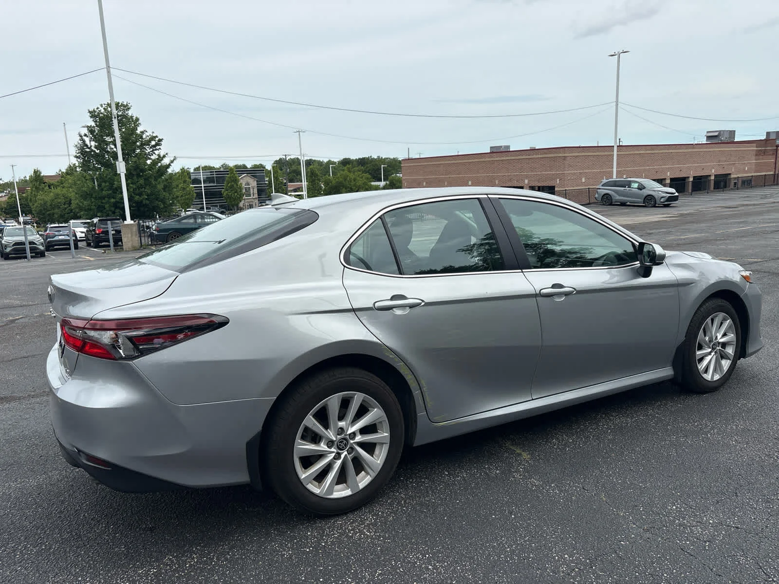 Used 2024 Celestial Silver Metallic Toyota LE image 7