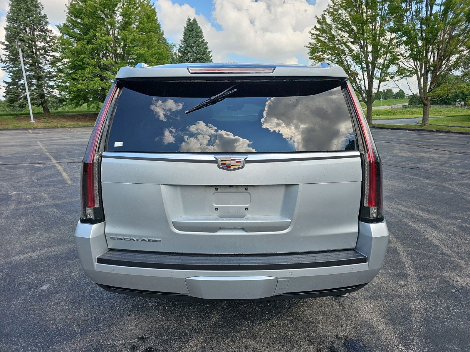 Used 2016 Radiant Silver Metallic Cadillac Luxury Collection image 4