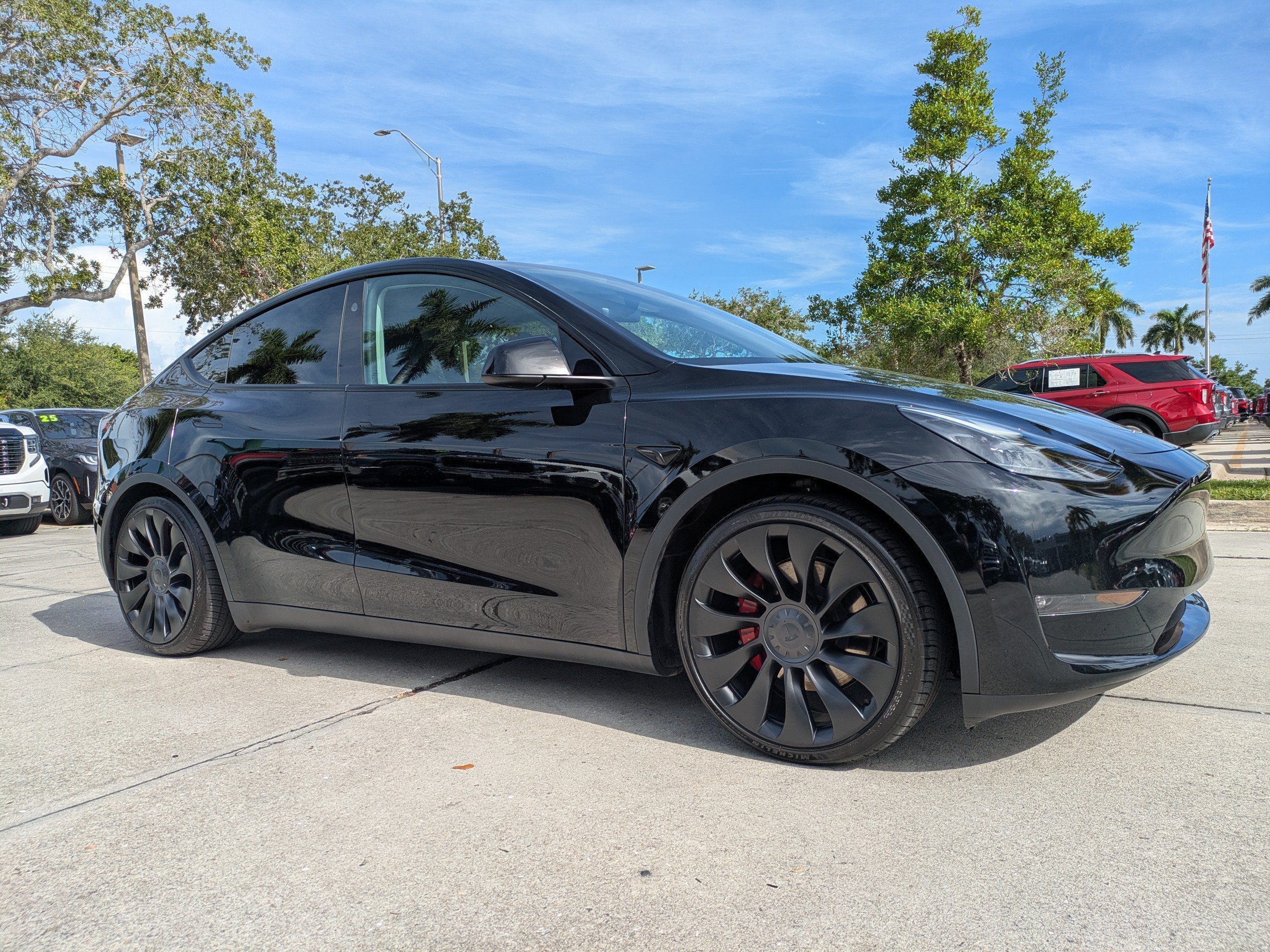 Used 2023 Tesla Model Y Performance with VIN 7SAYGDEF7PF831044 for sale in Naples, FL