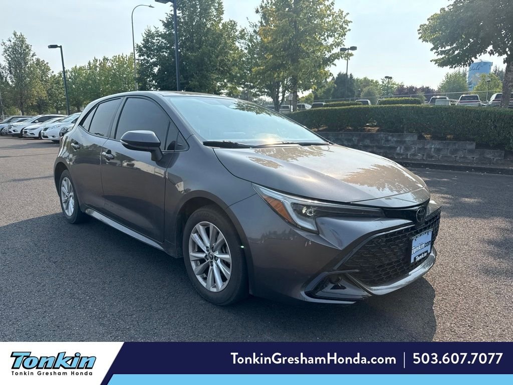 Used 2023 Magnetic Gray Metallic Toyota SE image 1