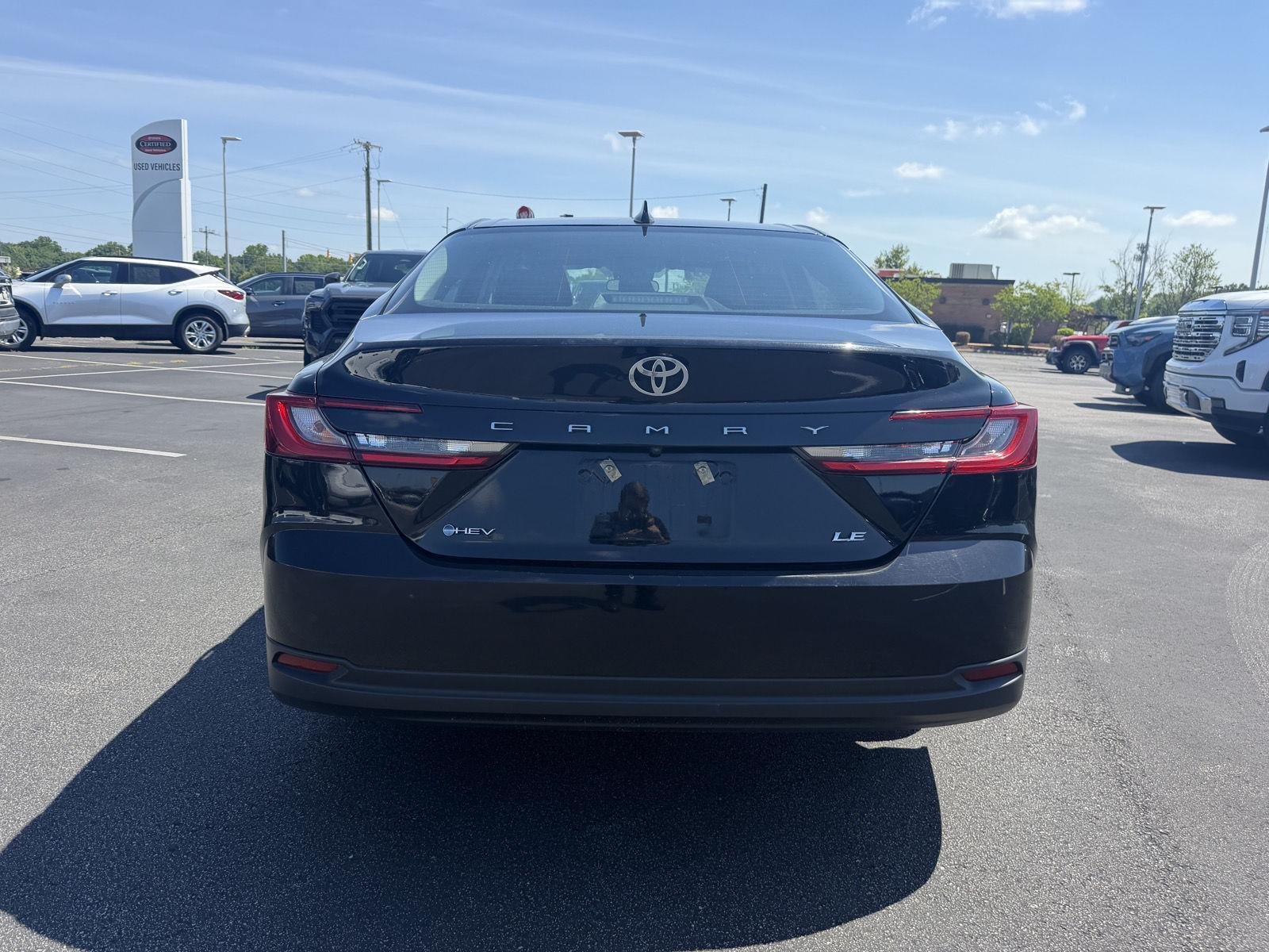 Used 2025 Midnight Black Metallic Toyota LE image 6