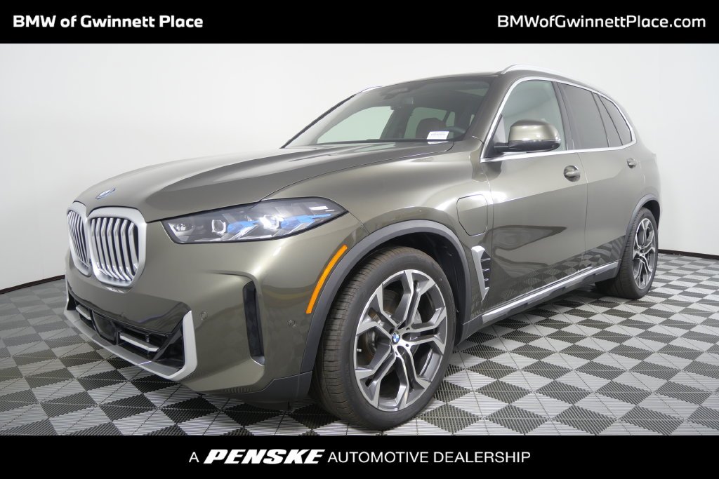 New 2026 Green Metallic BMW xDrive50e image 1