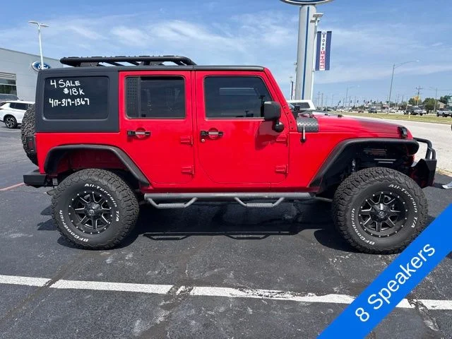 Used 2015 Firecracker Red Jeep Unlimited Sport image 4