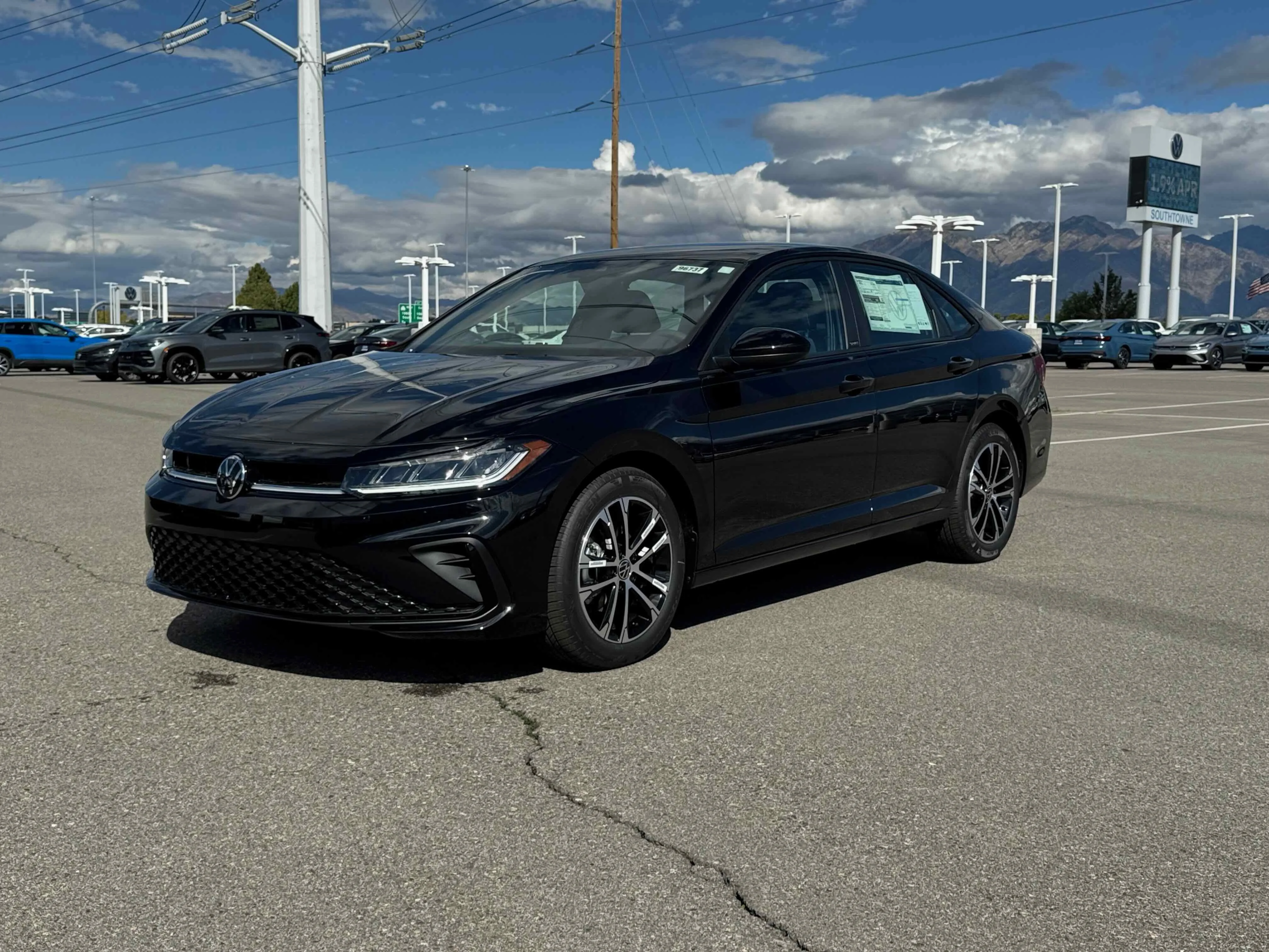 New 2026 Deep Black Volkswagen Sport image 1