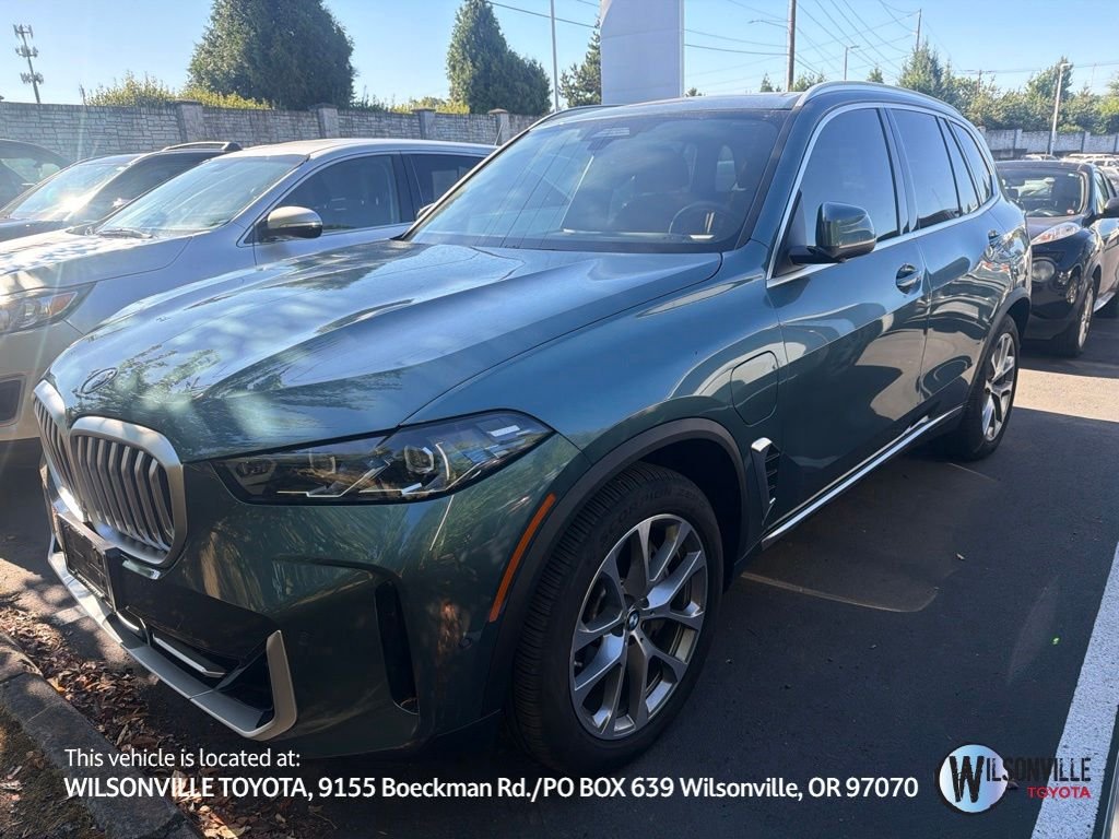 Used 2026 Blue BMW xDrive50e image 1