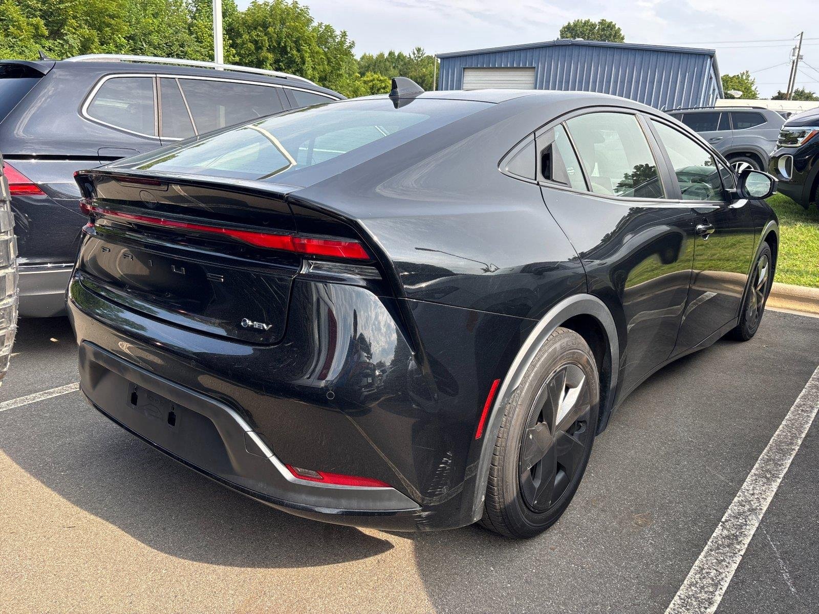 Used 2023 Midnight Black Metallic Toyota LE image 5