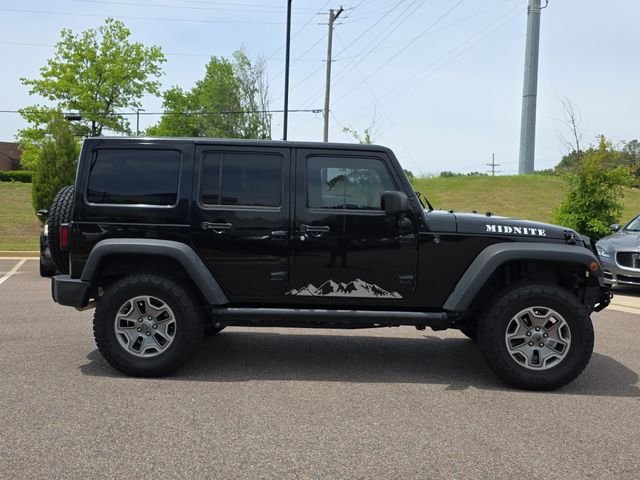 Used 2014 Jeep Wrangler Unlimited Rubicon with VIN 1C4BJWFG3EL129837 for sale in Southaven, MS