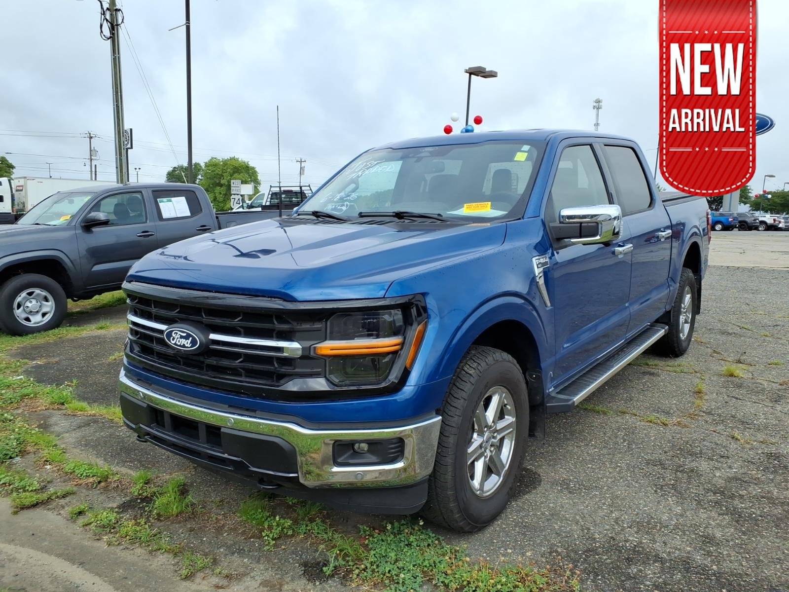 Used 2024 Atlas Blue Metallic Ford XLT image 1