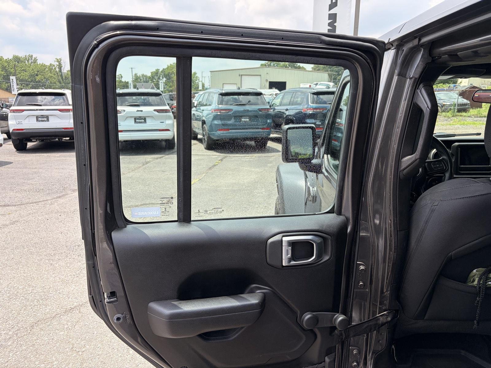 Used 2022 Granite Crystal Metallic Clearcoat Jeep Unlimited Sport image 13