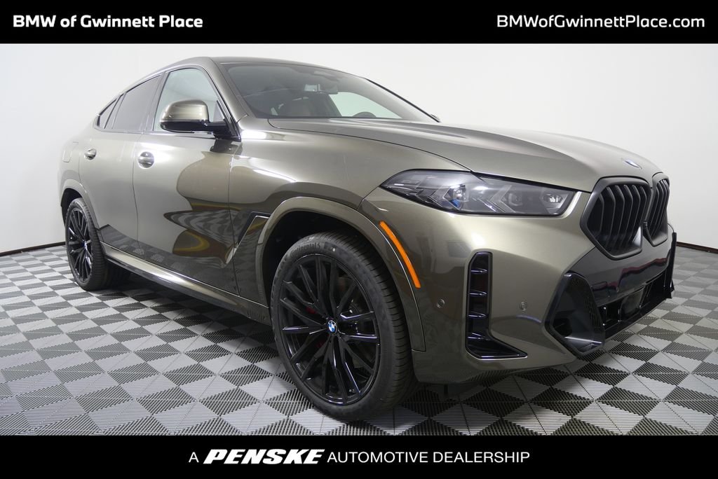 Used 2027 Green Metallic BMW xDrive40i image 1