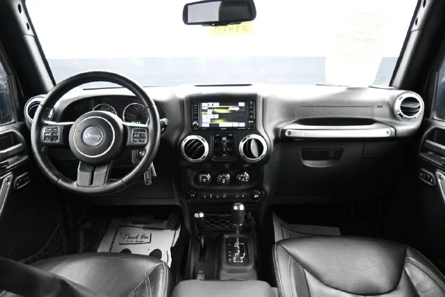 Used 2017 Black Jeep Unlimited Sahara image 19