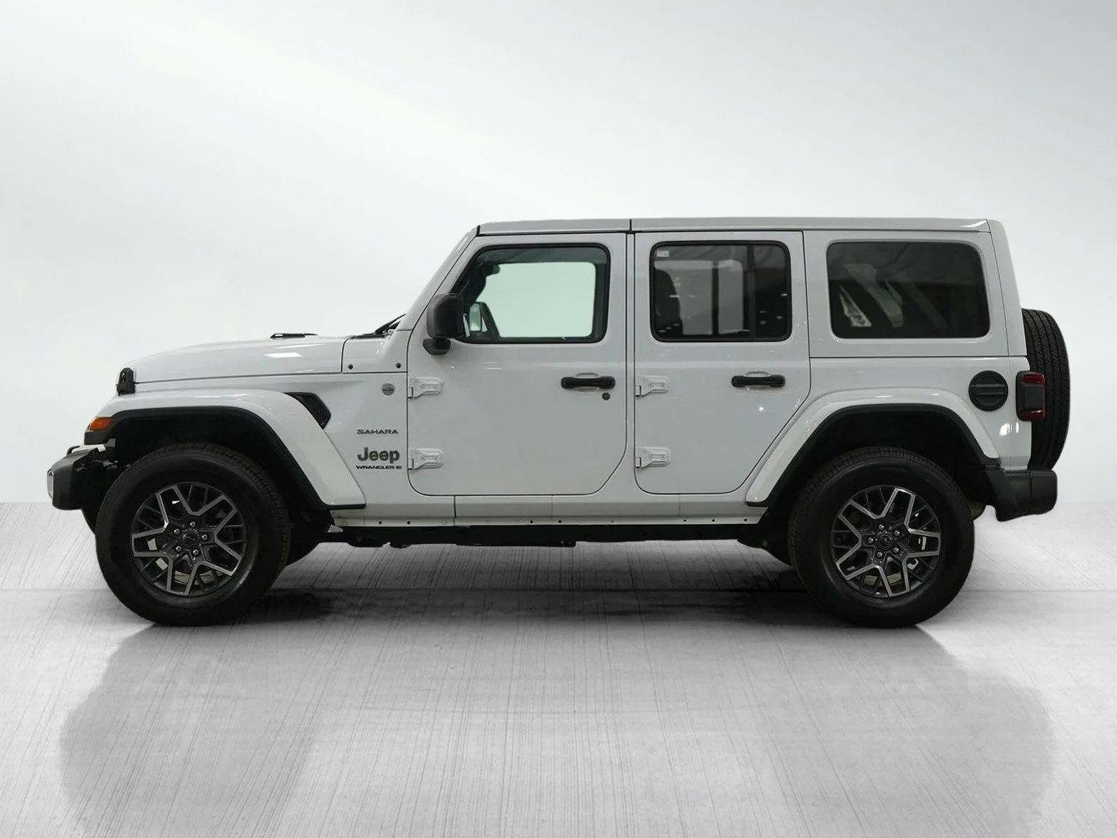 Used 2024 Jeep Wrangler 4-Door Sahara with VIN 1C4PJXEN0RW171835 for sale in Burnsville, Minnesota