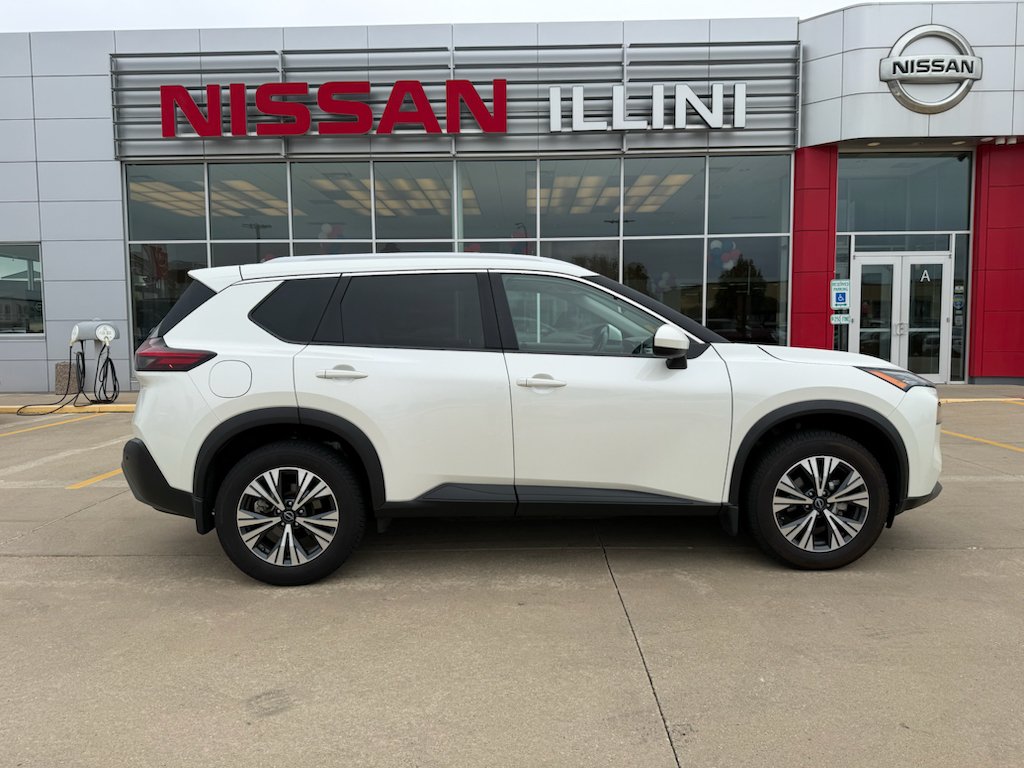 Used 2023 Pearl White Tricoat Nissan SV image 1