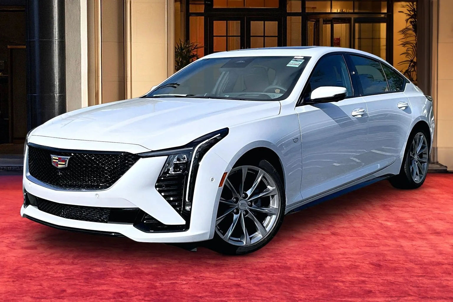 New 2026 Vibrant White Tricoat Cadillac Sport image 1