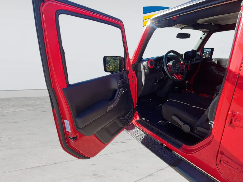 Used 2013 Red Jeep Unlimited Sport image 33