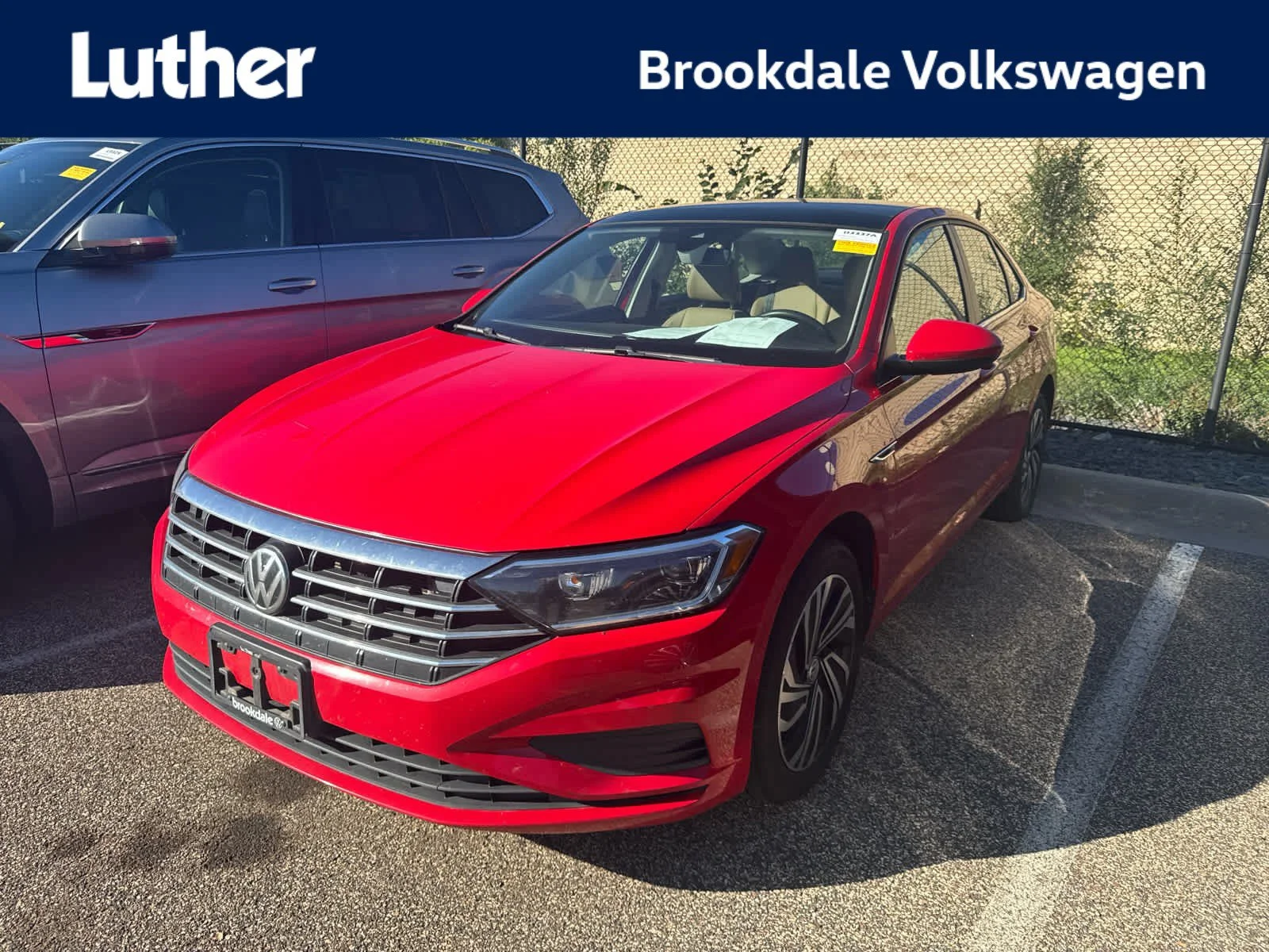 Used 2020 Tornado Red Volkswagen SEL image 1