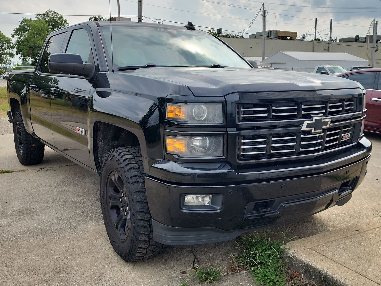 Used 2015 Black Chevrolet LTZ image 1