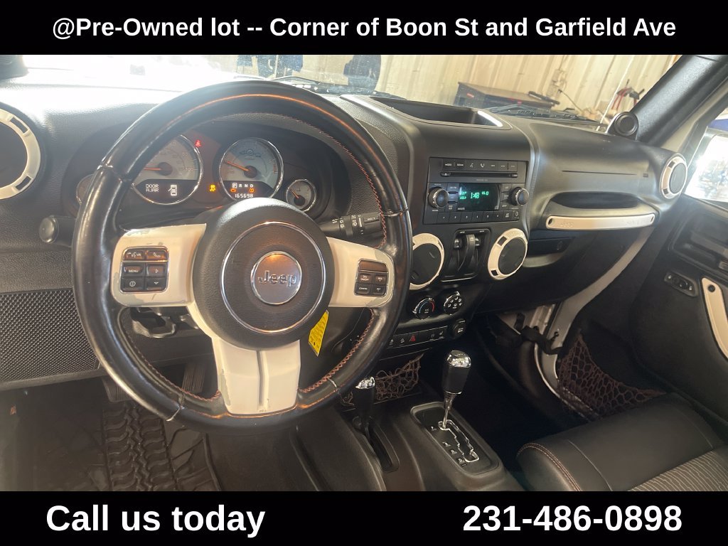 Used 2012 Silver Jeep Sahara image 24