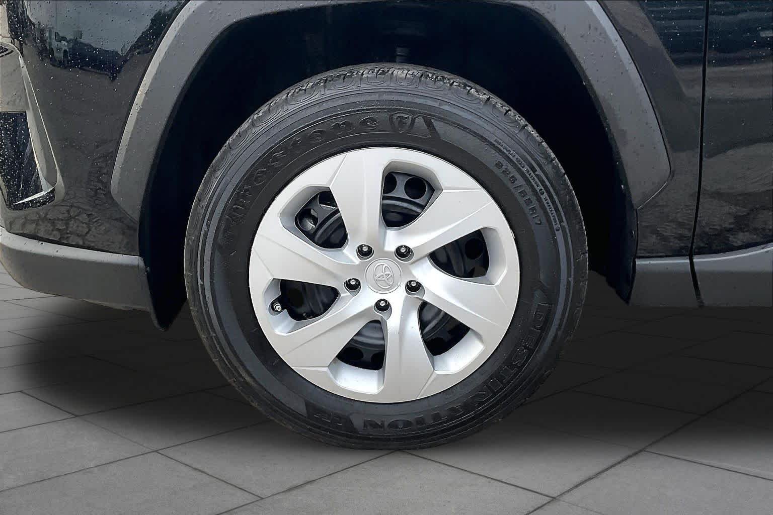 Used 2025 Midnight Black Metallic Toyota LE image 11