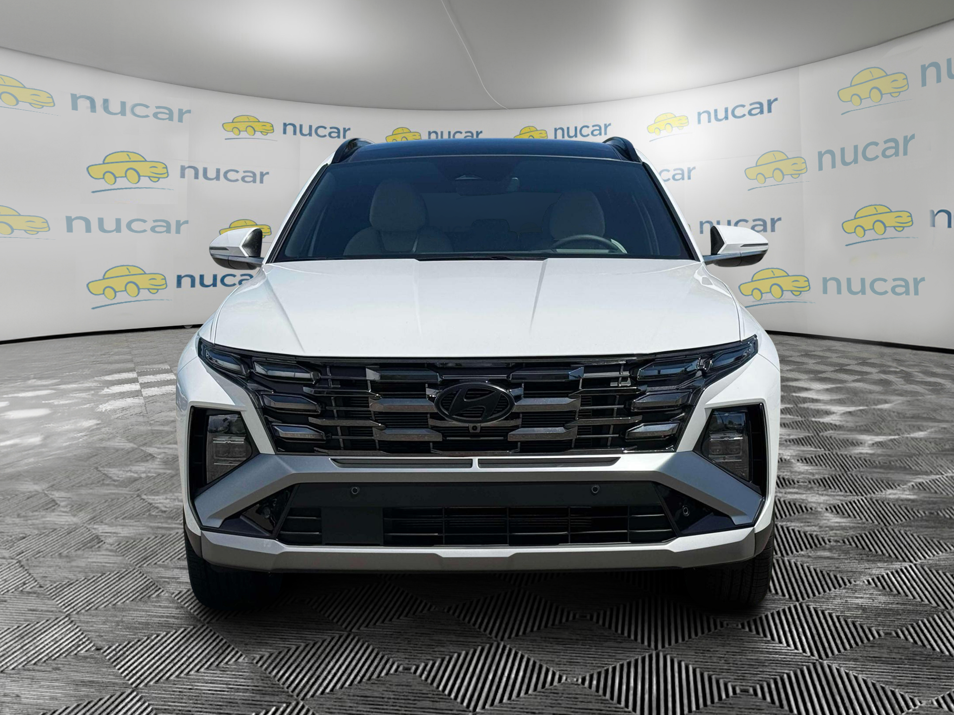 2026 Hyundai Tucson Limited in White at Nucar — photo 12