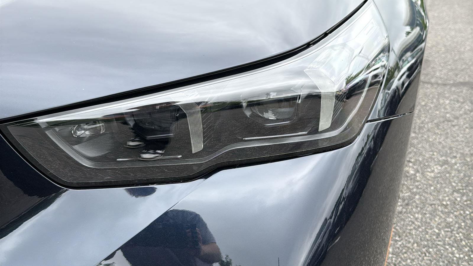 New 2027 Carbon Black Metallic BMW 550e xDrive image 7