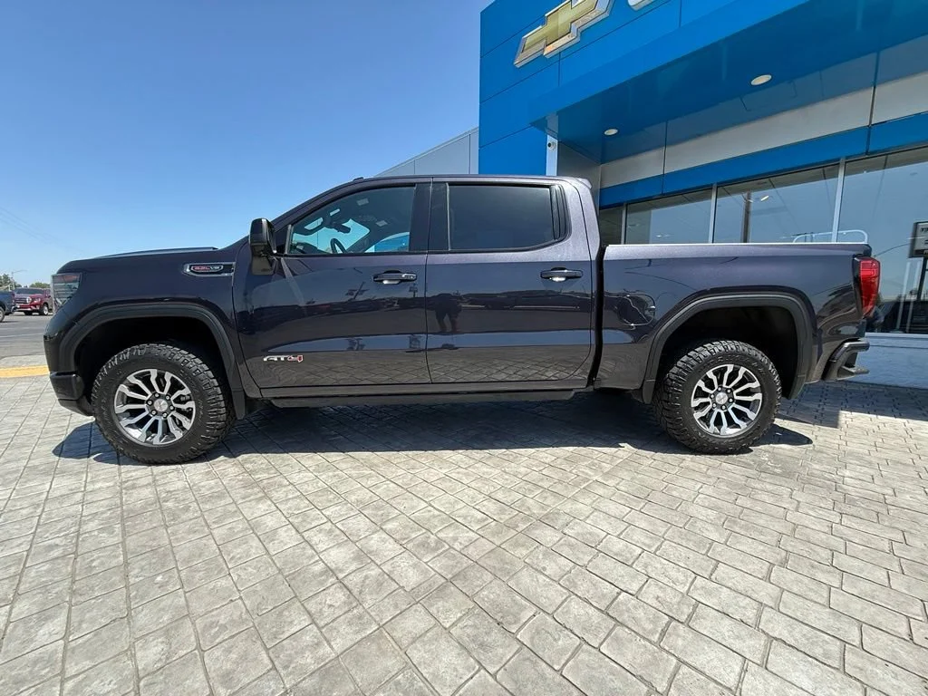 Used 2023 Titanium Rush Metallic GMC AT4 image 7