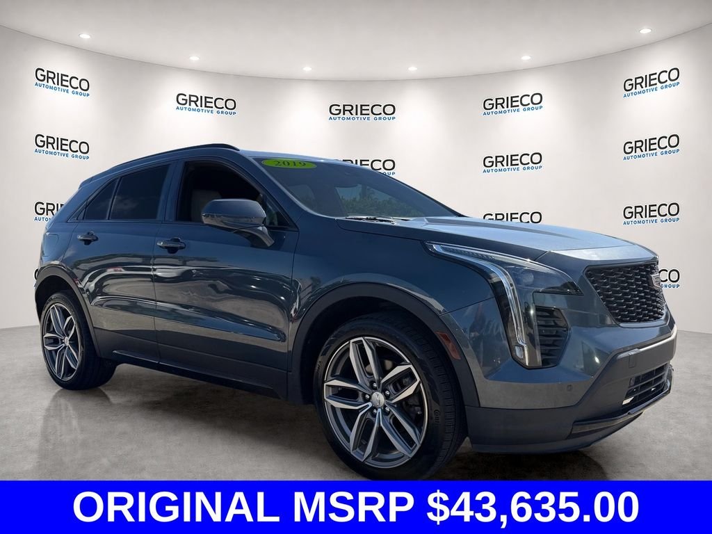 Used 2019 Gray Cadillac Sport image 1