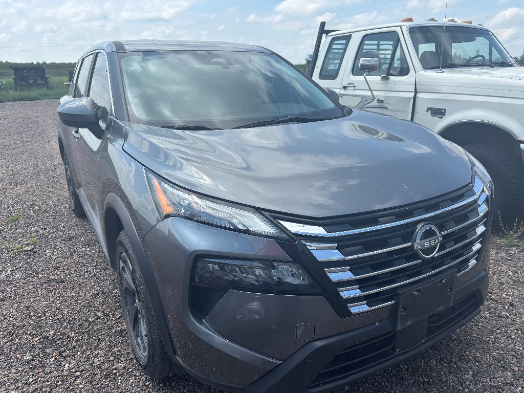 Used 2024 Gun Metallic Nissan SV image 2