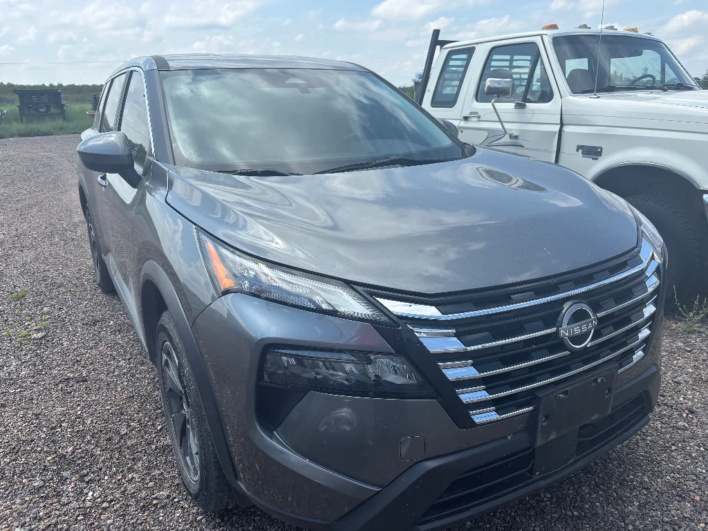 Used 2024 Gun Metallic Nissan SV image 2