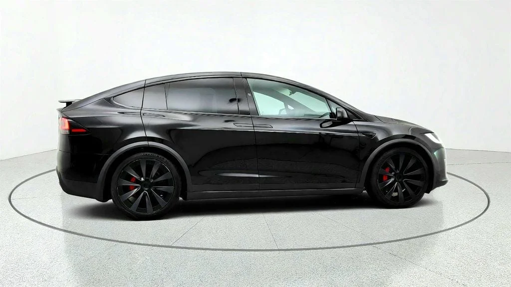 Used 2024 Solid Black Tesla Plaid AWD w/ 22
