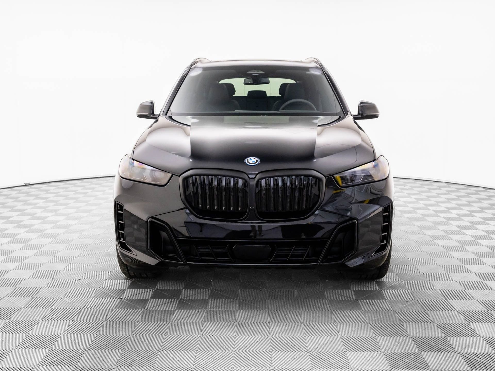 New 2026 Black Sapphire Metallic BMW xDrive50e image 9