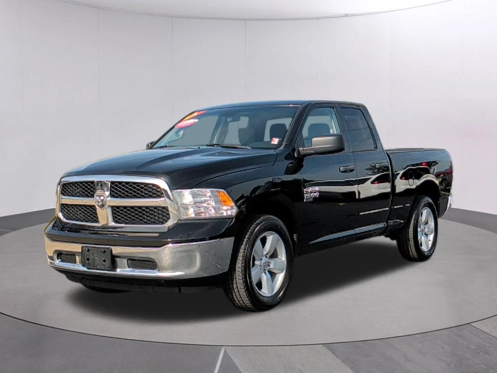 Used 2024 Diamond Black Crystal Pearlcoat Ram SLT image 1