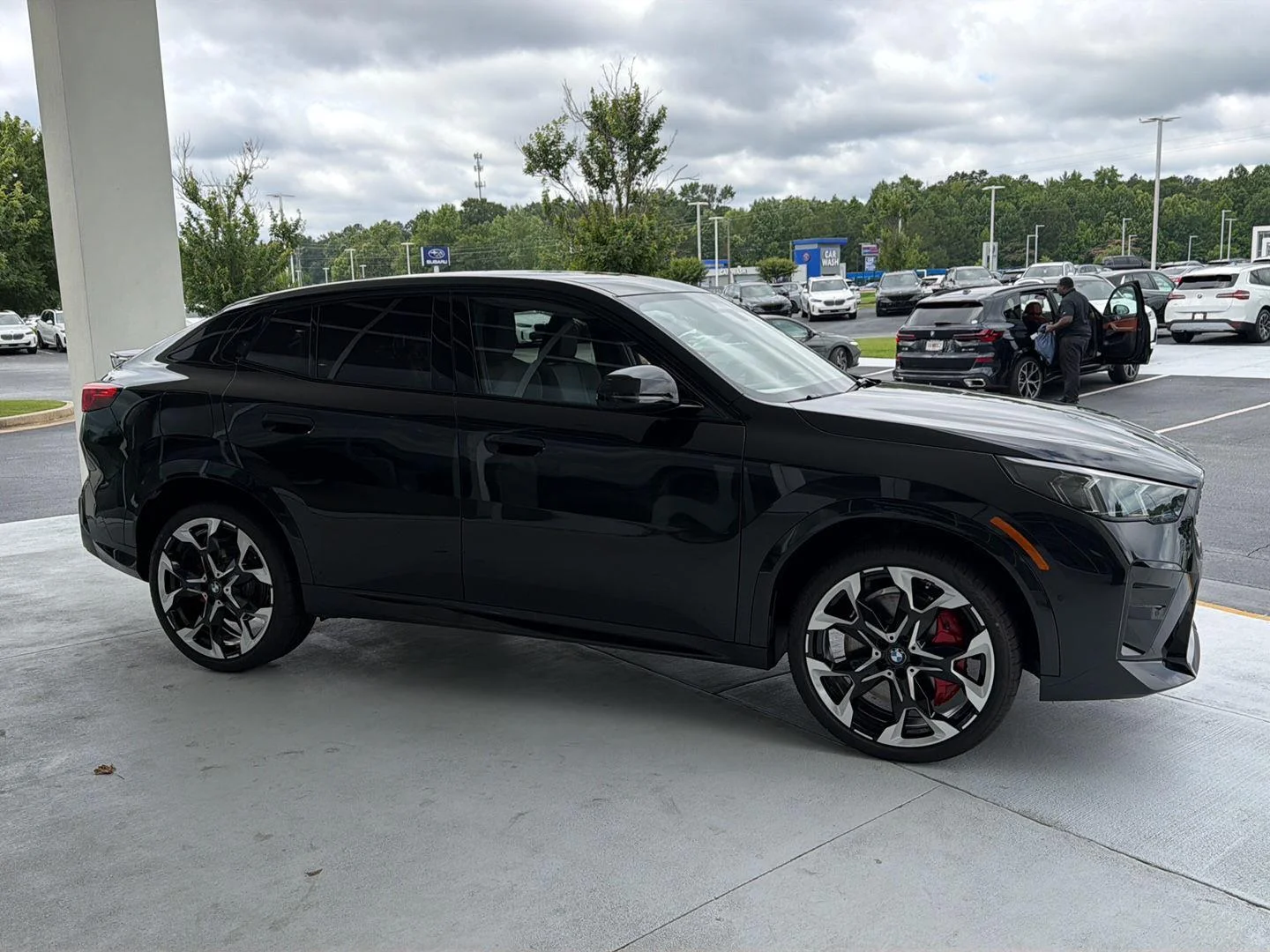 New 2026 Black Sapphire Metallic BMW xDrive28i image 7