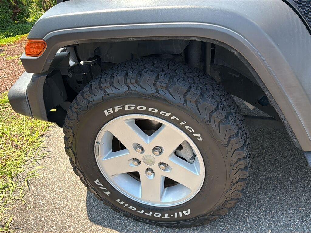 Used 2021 Granite Crystal Metallic Clearcoat Jeep Unlimited Sport S image 8