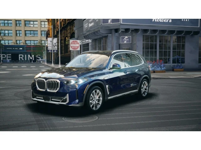 New 2026 Tanzanite Blue II Metallic BMW xDrive50e image 1