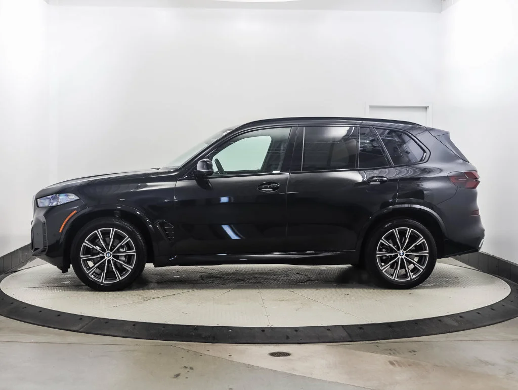 Certified Used 2026 Black Sapphire Metallic BMW xDrive40i image 2