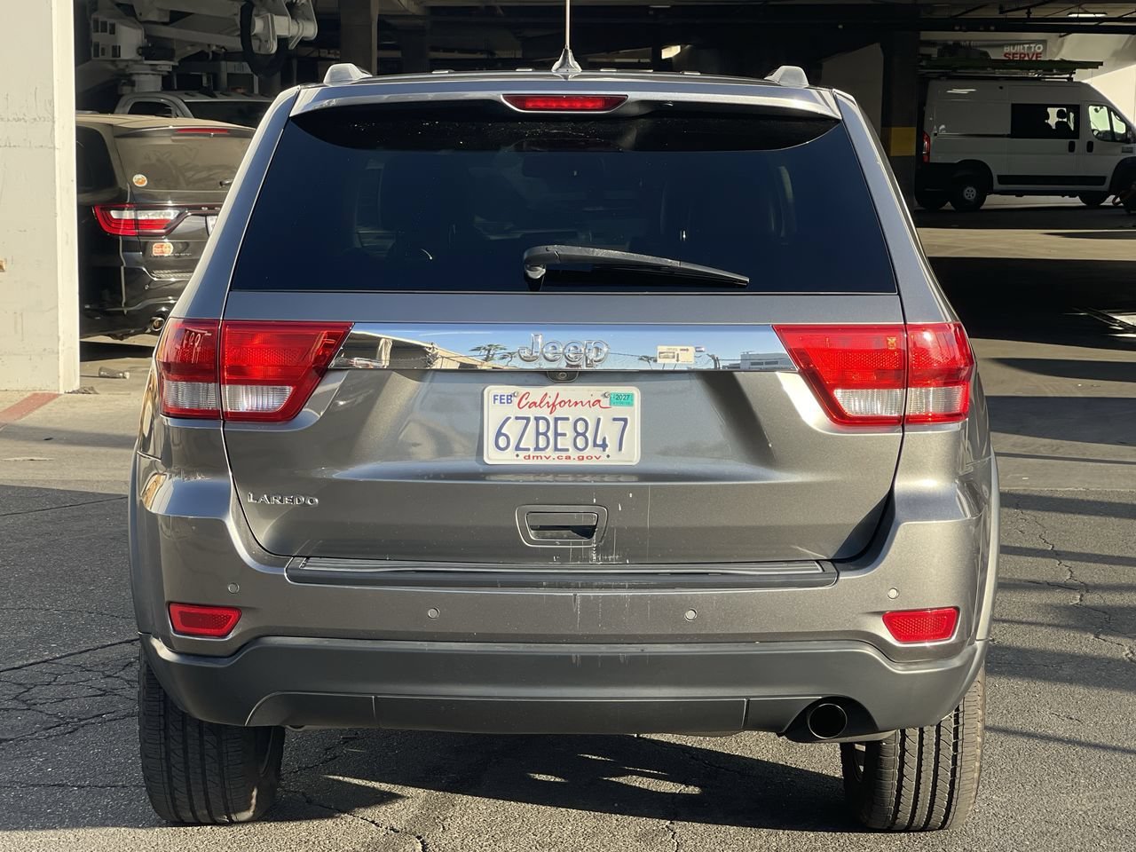 Used 2013 Mineral Gray Metallic Jeep Laredo image 4