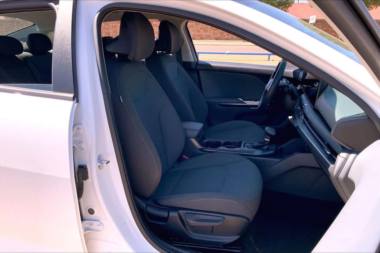 Used 2025 Snow White Pearl Kia LXS image 9