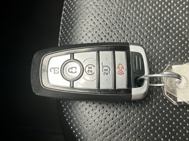 Used 2020 Blue Metallic Ford Titanium image 28