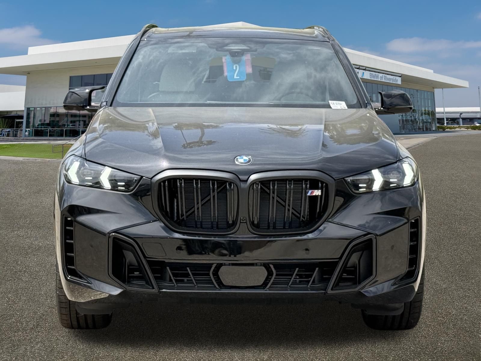 New 2026 Black Sapphire Metallic BMW M60i image 3