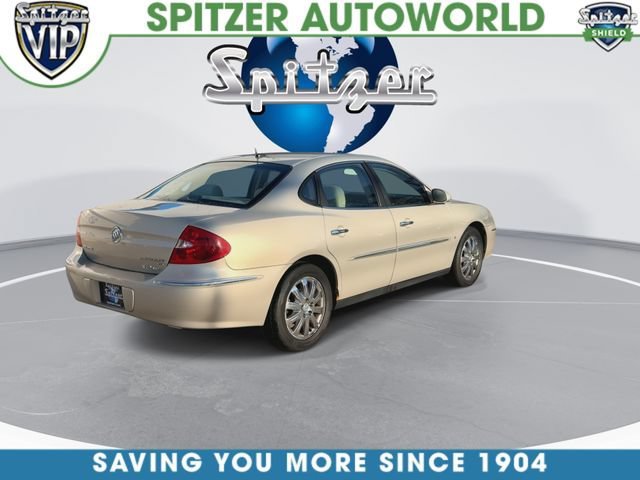 Used 2009 GOLD MIST METALLIC Buick CX image 9