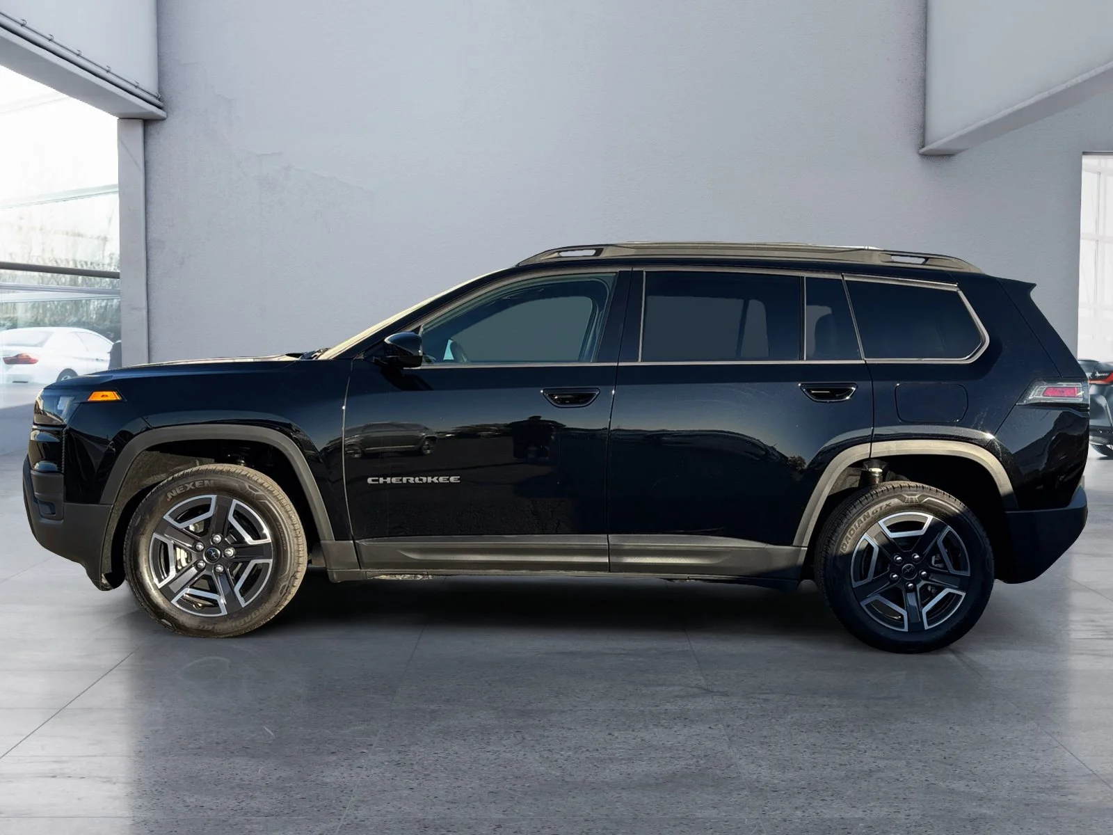 New 2026 Diamond Black Crystal Pearl Jeep Laredo image 2