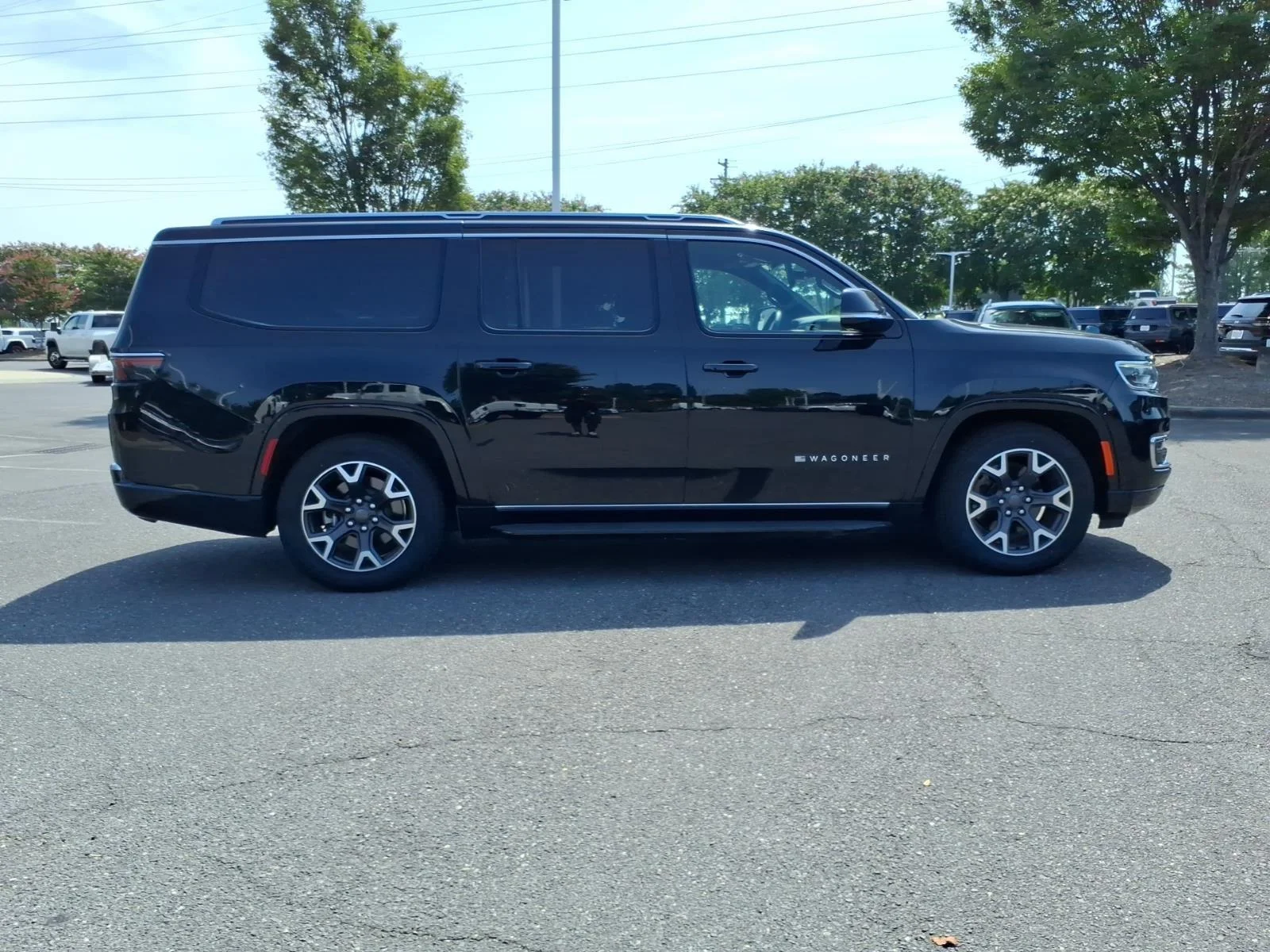 Used 2024 Diamond Black Crystal Pearlcoat Jeep Series III image 12