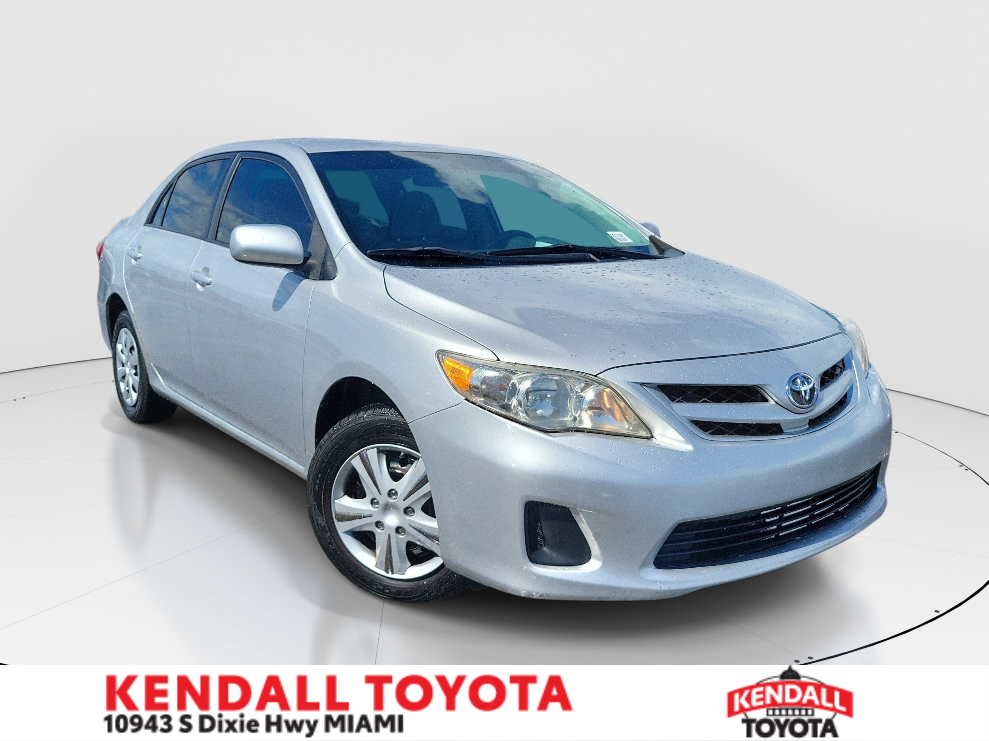 Used 2011 Classic Silver Metallic Toyota LE image 1