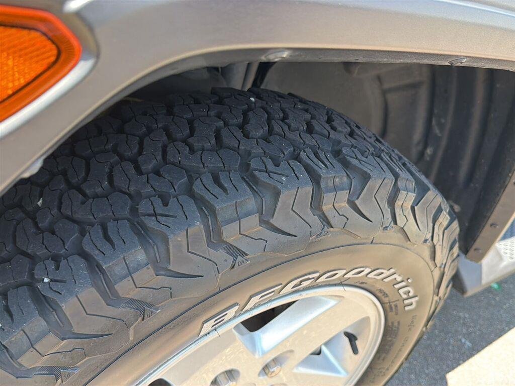 Used 2021 Granite Crystal Metallic Clearcoat Jeep Unlimited Sport S image 9